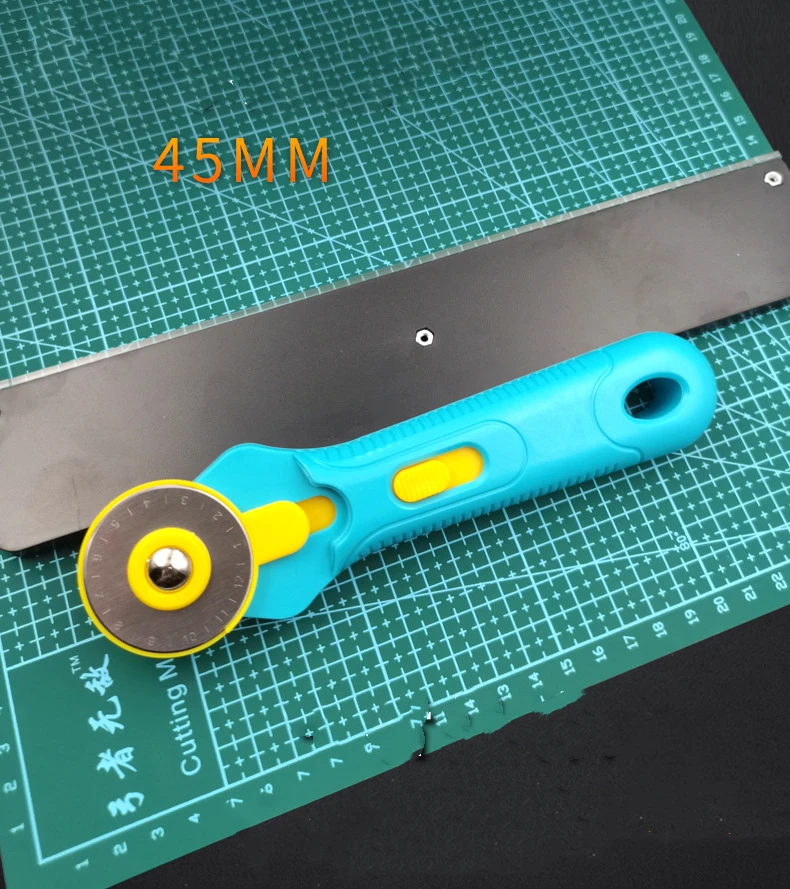 Pisau pemotong bulat baja Puta - Rotary Cutter Fabric ulasan dan harga